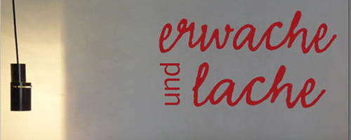 Erwache und Lache Tattoo Silbensalon